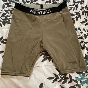 FEAR OF GOD ESSENTIALS 
SPANDEX SHORTS 

SIZE: MEDIUM 

ALSO FITS A SMALL